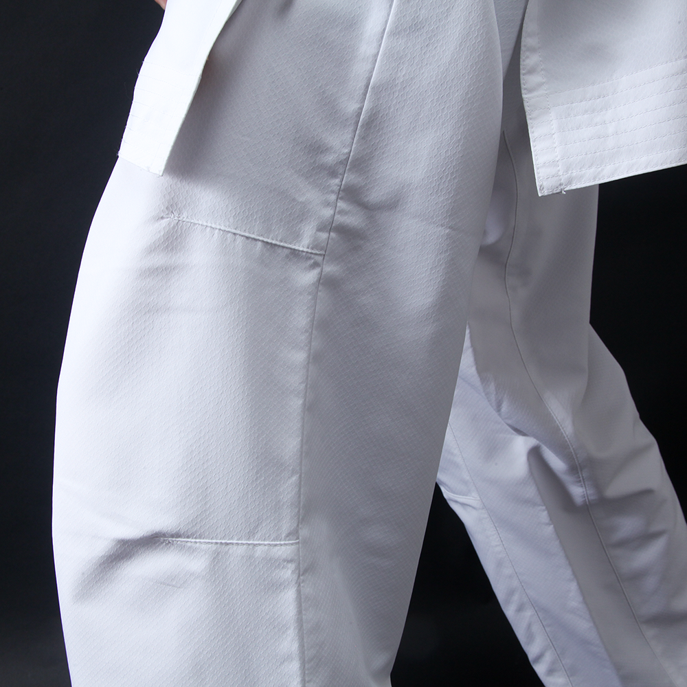 Hayate white martial arts pants on a black background
