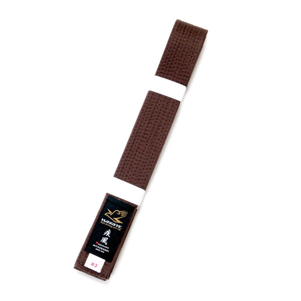 Brown belt with a black label on a white background