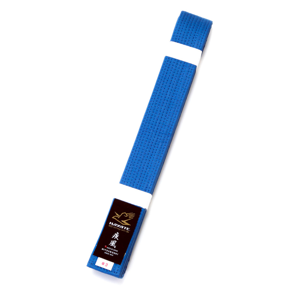 Blue martial arts belt with a Hayate brand label on a white background