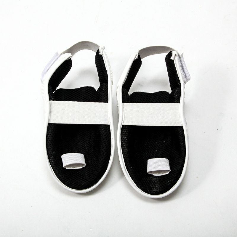 Back of a pair of Hayate brand instep protectors on a white background